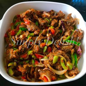 Asun, (Grilled Peppered Goat Meat)